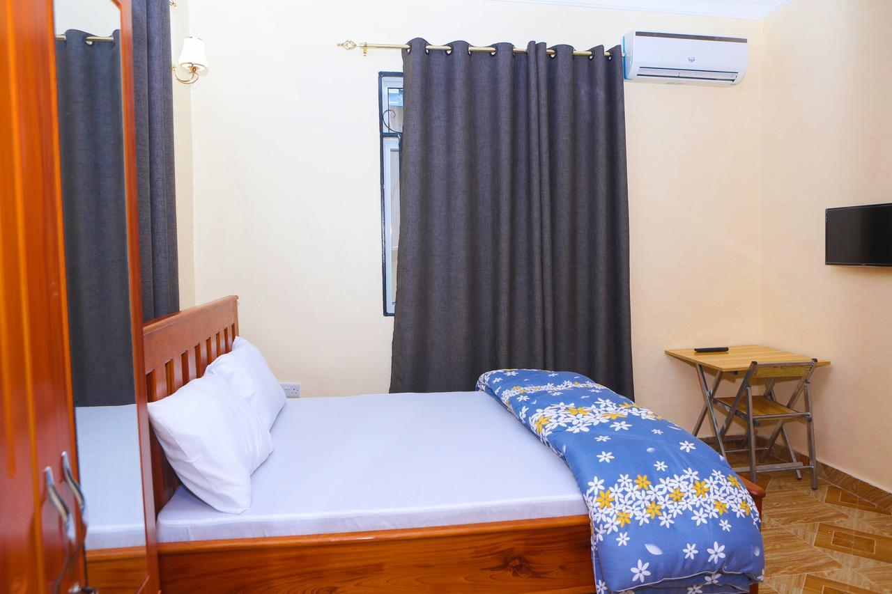Chibuba Airport Accommodation ダル・エス・サラーム エクステリア 写真