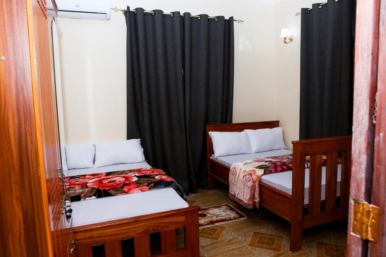 Chibuba Airport Accommodation ダル・エス・サラーム エクステリア 写真