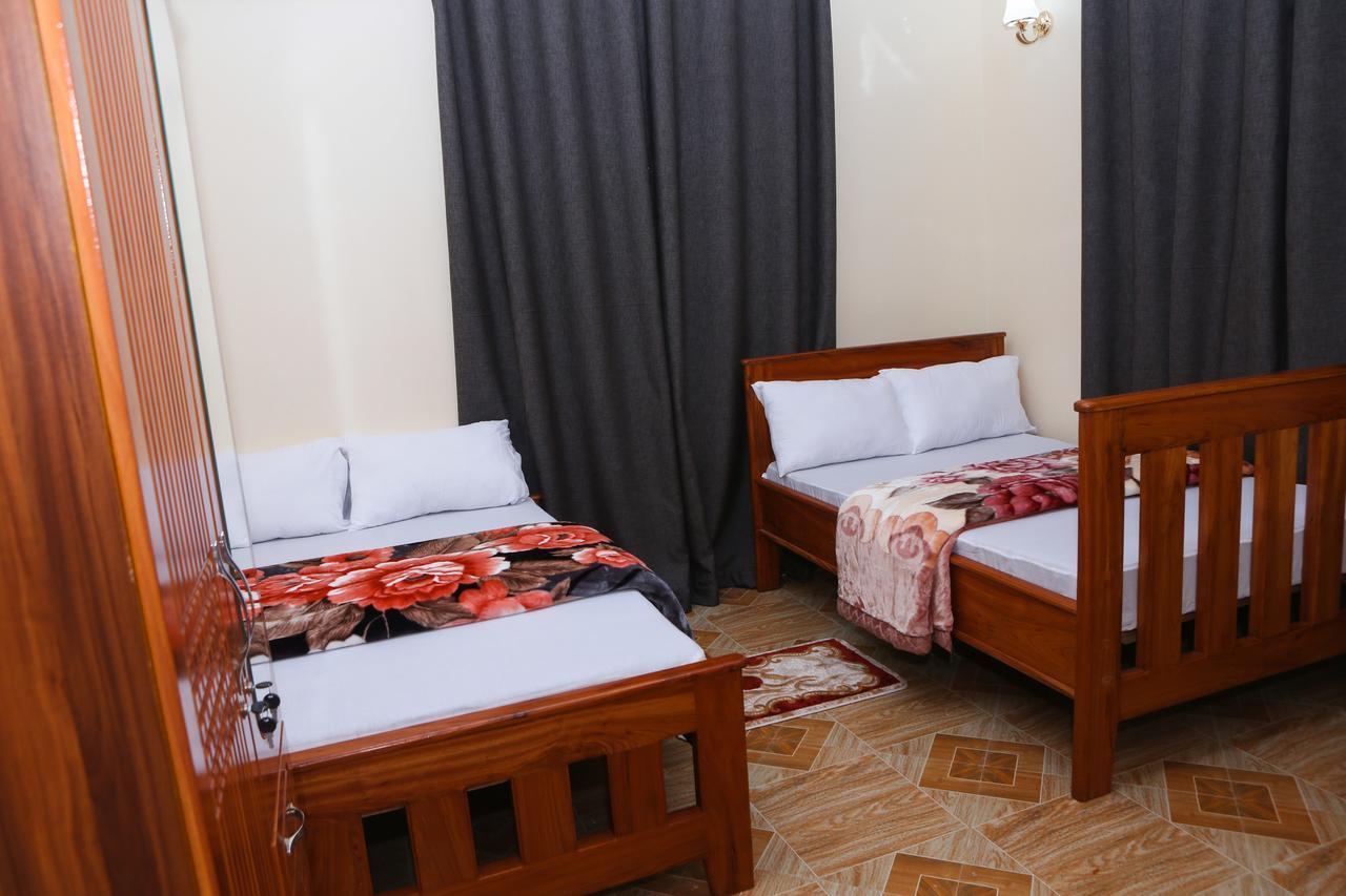 Chibuba Airport Accommodation ダル・エス・サラーム エクステリア 写真